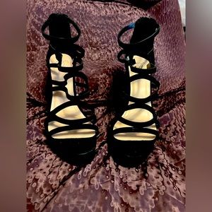 Black strapped heals